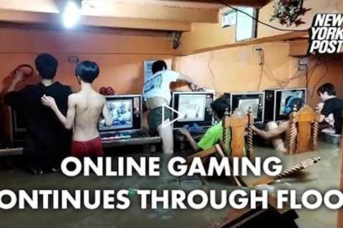 Online gaming addicts in cafe continue playing through typhoon flood | New York Post